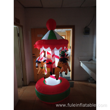 Happy holiday inflatable spinning carrousel for Christmas